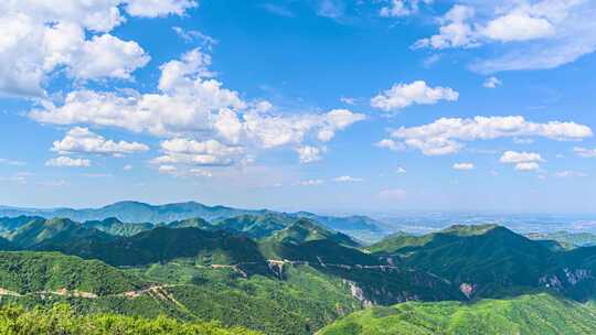 夏季蓝天白云下绿水青山群山航拍