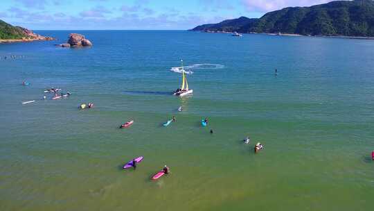 航拍三亚后海皇后湾冲浪及海棠湾海岛海浪