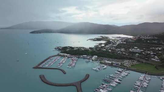 艾尔利港海滩湾泻湖珊瑚海码头空中无人机雨