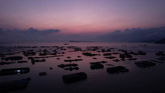 旋转航拍海面船只霞光深圳大鹏南澳海景