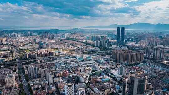云南昆明双子塔与昆明火车站航拍城市风景