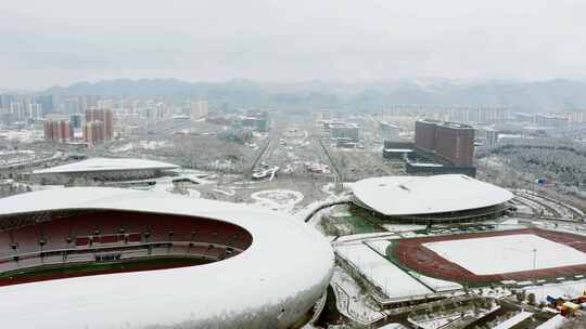 遵义市新蒲新区奥体中心雪景视频素材模板下载