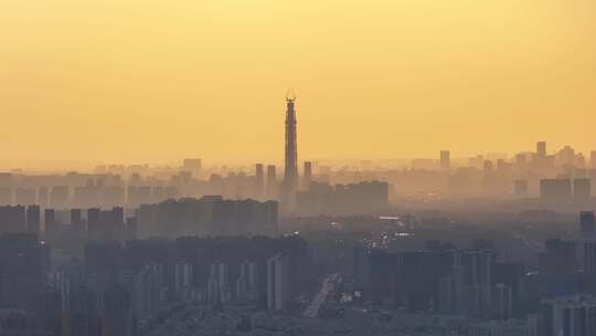 长焦航拍城市建筑日落剪影