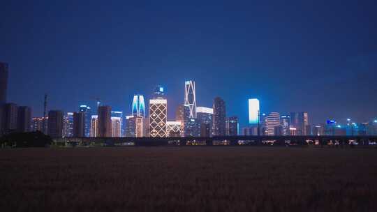 杭州城市建筑风景与高铁同框夜景