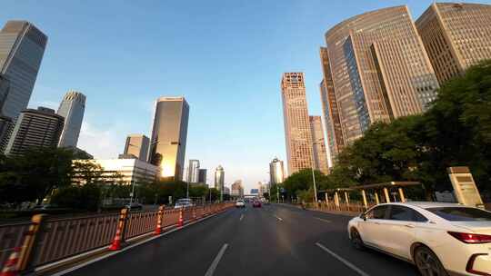 开车行驶在北京国贸CBD城市地标建筑