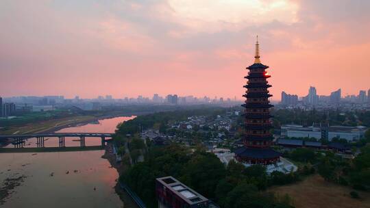 航拍夕阳金华老城区地标古建筑万佛塔