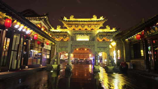 山西大同古城鼓楼夜景飘雪下雨雪景