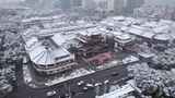 城市中式建筑雪景航拍 永康市区雪景高清在线视频素材下载