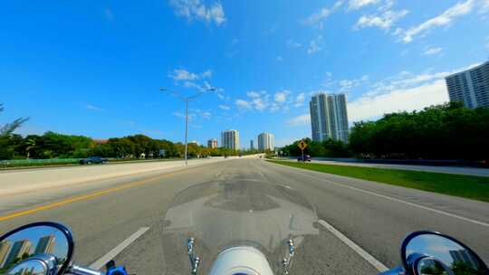 POV骑踏板车游览迈阿密堤道阳光岛海滩4k
