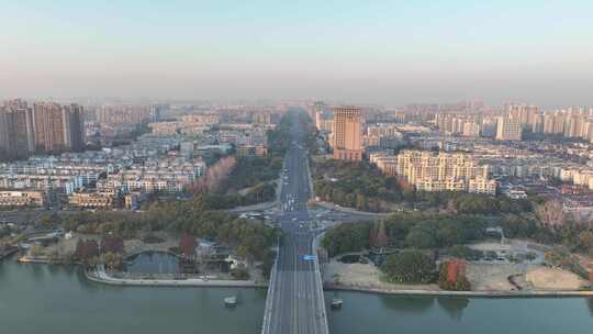 4K航拍昆山城市冬日日落风光建筑大景