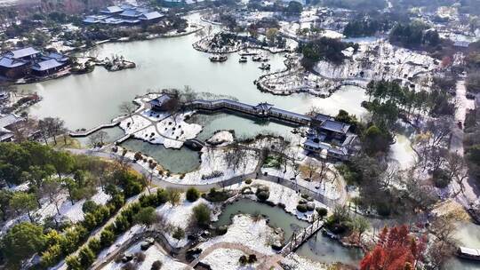 航拍瘦西湖风景区雪景园林古风