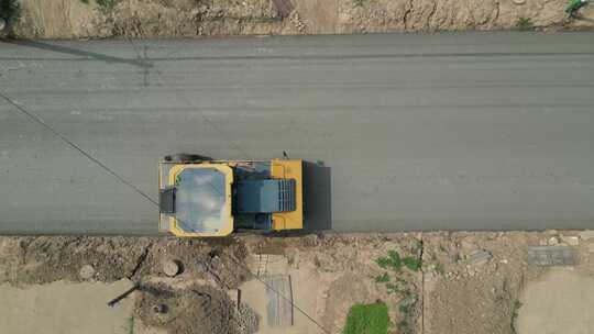乡村市政公路铺沥青修路建设施工航拍视频素材模板下载