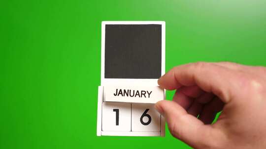 01.绿色背景上日期为1月16日的日历。
