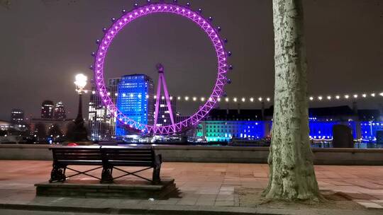 伦敦眼和国会大厦夜间灯光展示视频素材模板下载