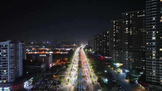 夜晚城市道路交通航拍下班车流路况夜景