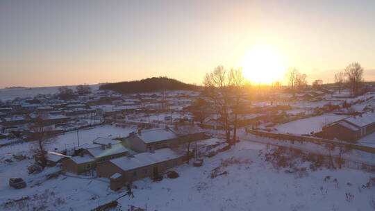 雪后村庄日落航拍空镜