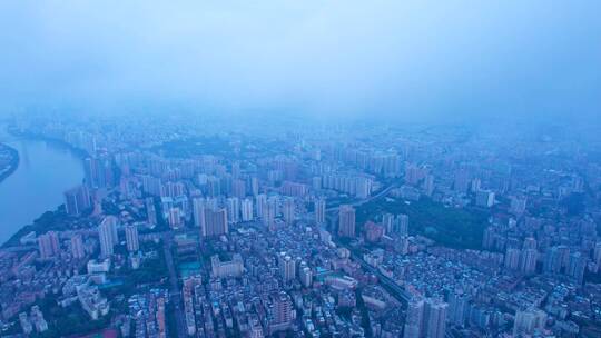 广州珠江岸城市高楼建筑与天空云雾航拍