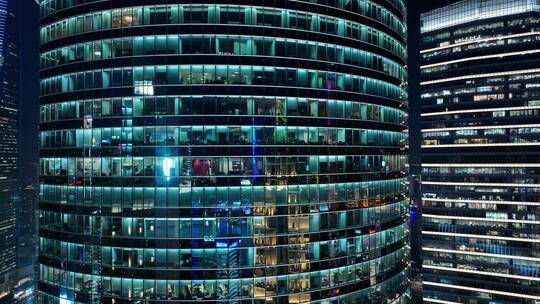 现代建筑夜晚灯光通明白领加班-上海陆家嘴