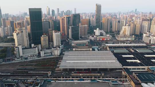 航拍日出时分的上海火车站视频素材模板下载