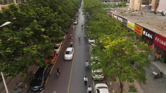 城市快递员电动车骑行航拍跟拍