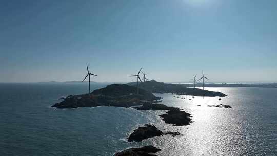 海上灯塔航拍海洋风车发电大海日出阳光海面