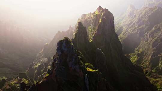 航拍高山森林山脉山顶山峰蓝天白云阳光