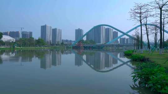 广州南沙蕉门河车行桥与城市摩天大楼建筑视频素材模板下载