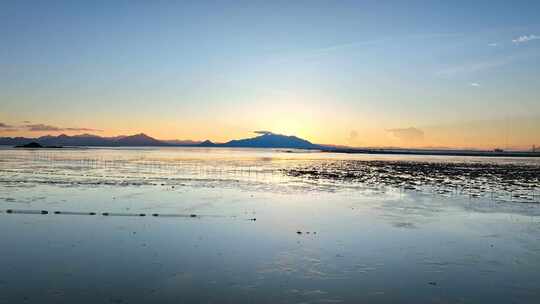 4k航拍日落晚霞后的滩涂海天一色
