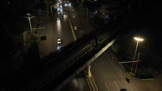 火车城市桥梁穿行夜景航拍