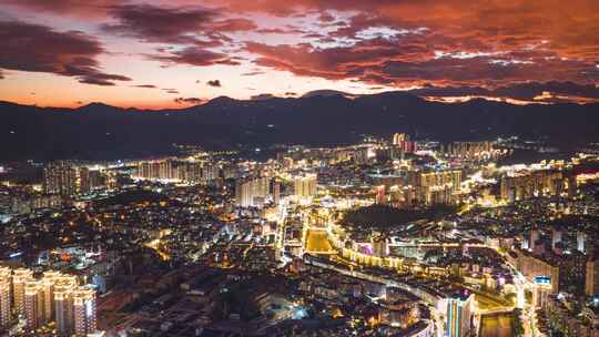 城市晚霞延时夜景航拍火烧云车流天空夕阳