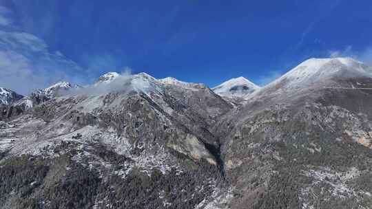 航拍川西贡嘎山乡高山森林雪景风光