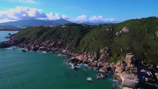 航拍海南三亚西岛海洋文化旅游区海浪礁石