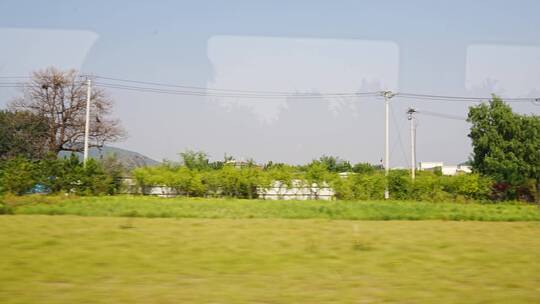 火车行驶窗外风景田野视频素材模板下载