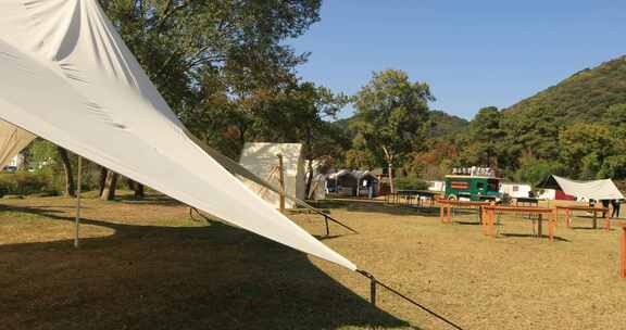 阳光帐篷户外休闲野营基地休闲度假空镜素材