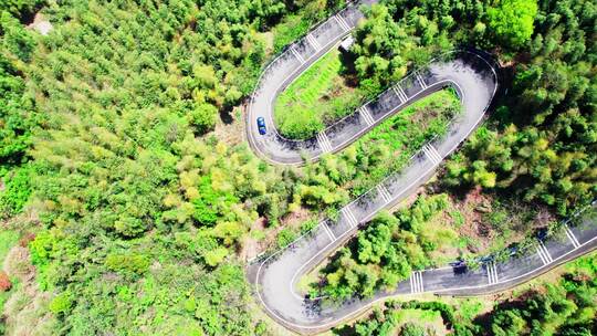 中国萧山寺坞岭乡村竹海中弯曲的盘山公路