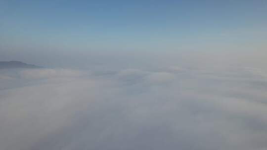 清晨大自然云海之上穿云航拍