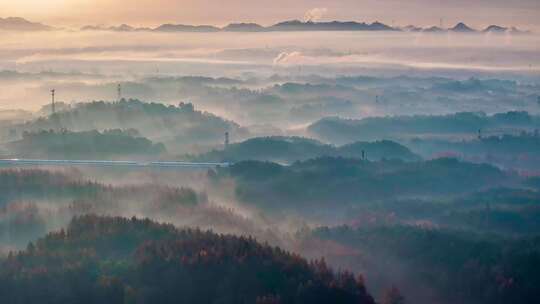 航拍高铁驶过山川与乡村