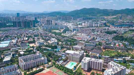 云南农业大学老校区背面带新校区航拍延时