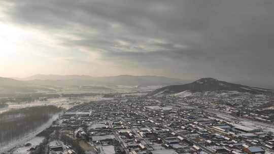 航拍内蒙古扎兰屯市冬季雪色村庄