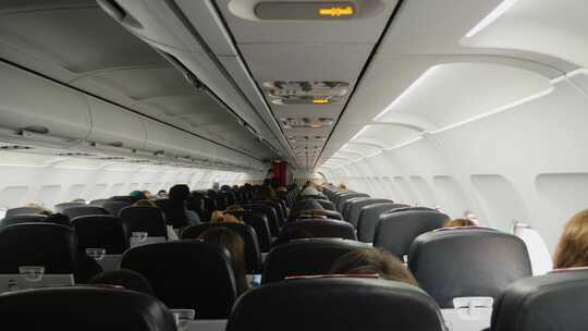 飞机机舱内乘客旅客视频素材模板下载