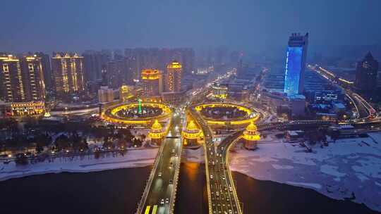 中国黑龙江哈尔滨公路大桥夜晚雪景航拍