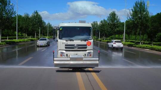 航拍宁夏银川洒水车路面清洁