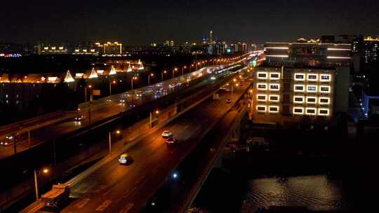 航拍上海夜晚城市轨道地铁穿行城市之中