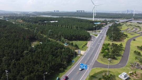 航拍山东威海海岸线公路风车唯美风光