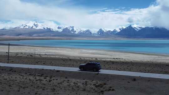 航拍自驾旅游新疆 雪山湖泊视频素材模板下载