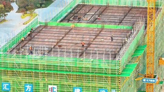 航拍工地建设施工塔吊建筑材料钢筋农民工