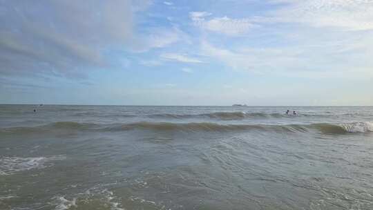 蓝天白云下广西北海大海沙海岸线风景风光