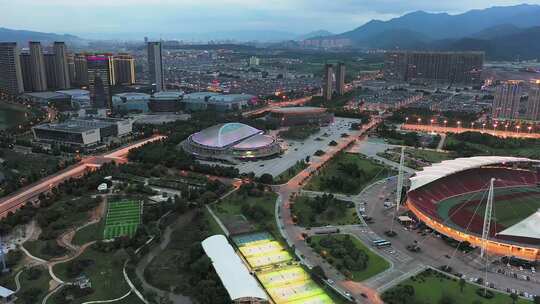 浙江义乌梅湖体育中心夜景航拍视频素材模板下载