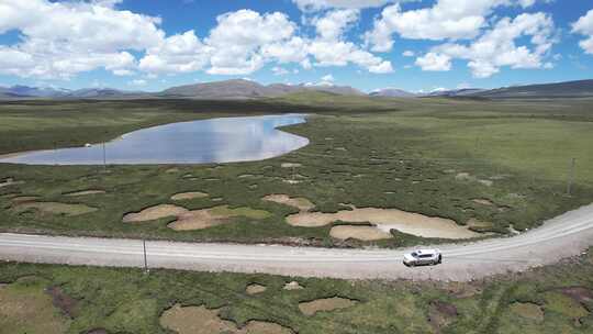 自驾西藏麦地卡湿地航拍 蓝天白云湿地湖泊视频素材模板下载