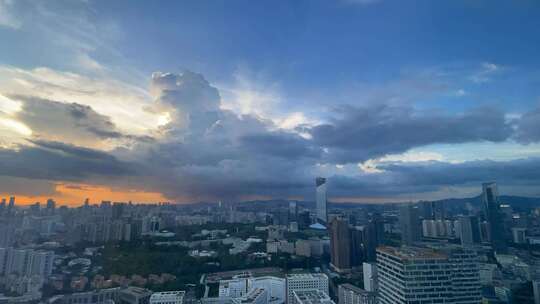 城市高楼大厦夕阳云层积雨云
